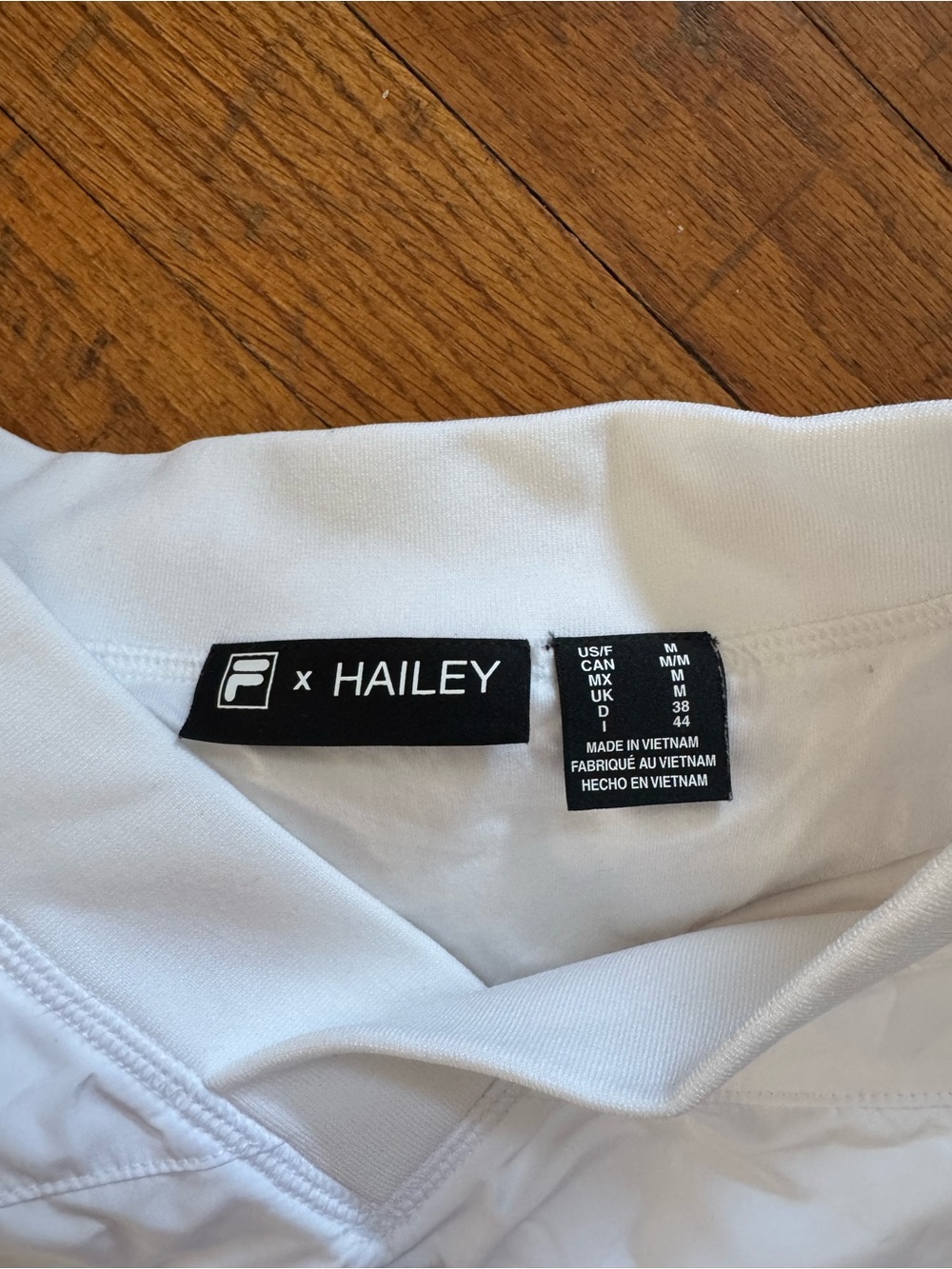 Hailey x Fila White V-Neck Polo with Signature Logo - Picture 2 of 4